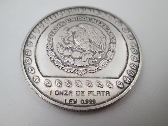 100 pesos United Mexican States coin. Eagle Warrior. Ounce pure sterling silver. 1992