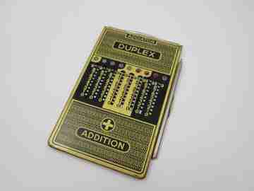 Addiator Duplex pocket mechanical calculator. Gold plated aluminum. Germany. 1950's