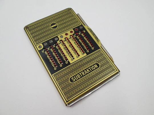 Addiator Duplex pocket mechanical calculator. Gold plated aluminum. Germany. 1950's