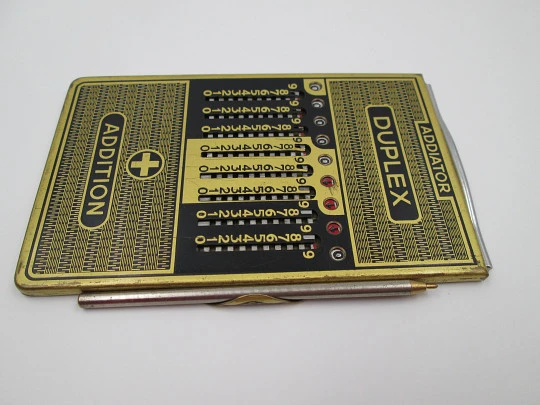 Addiator Duplex pocket mechanical calculator. Gold plated aluminum. Germany. 1950's