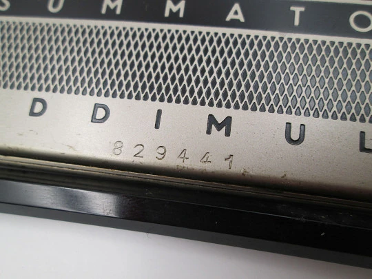 Addimult mechanical calculator. Bitone metal. Cover & marker. 1960s. Germany