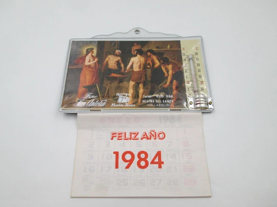 Advertising calendar with a thermometer and a representation of Vulcan's Forge. 1984