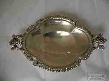 Almond dish. Sterling silver. Vegetable motifs and faces. 1970's