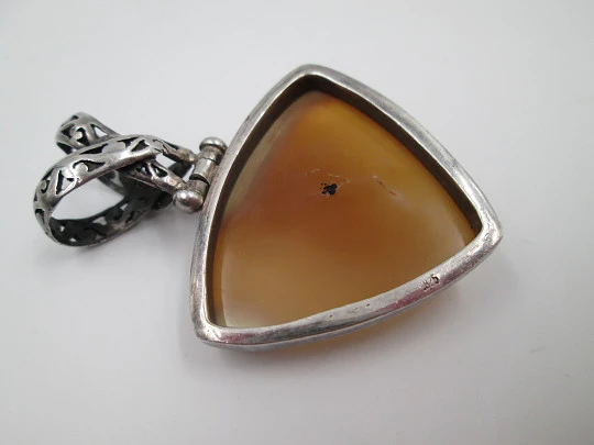 Amber tone stone triangular pendant. 925 sterling silver. Openwork loop