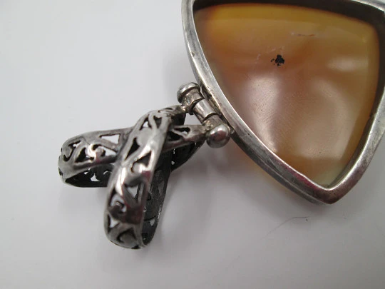 Amber tone stone triangular pendant. 925 sterling silver. Openwork loop