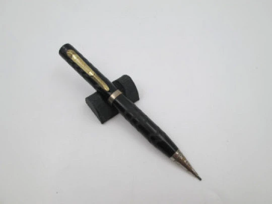 American mechanical pencil. Black hard rubber and metal trims. Twist system. 1930's