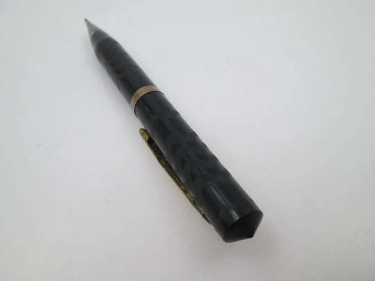 American mechanical pencil. Black hard rubber and metal trims. Twist system. 1930's