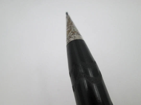 American mechanical pencil. Black hard rubber and metal trims. Twist system. 1930's