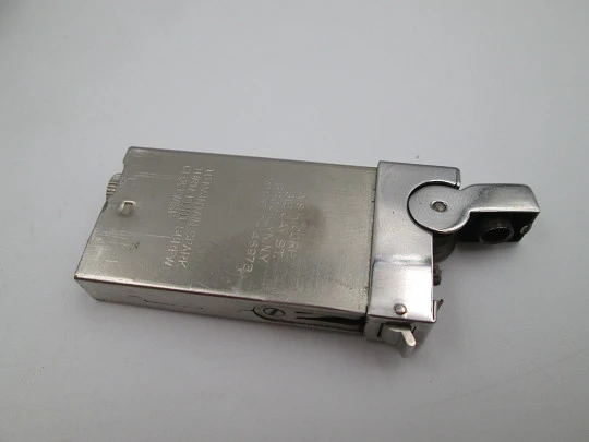 American Safety Razor table petrol lighter. Chrome metal and wood handle. USA. 1940's American Safety Razor table petrol lighter. Chrome metal and wood handle. USA. 1940's