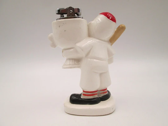 Amico figurative table petrol lighter. Baseball player with trophy porcelain. Japan. 1962