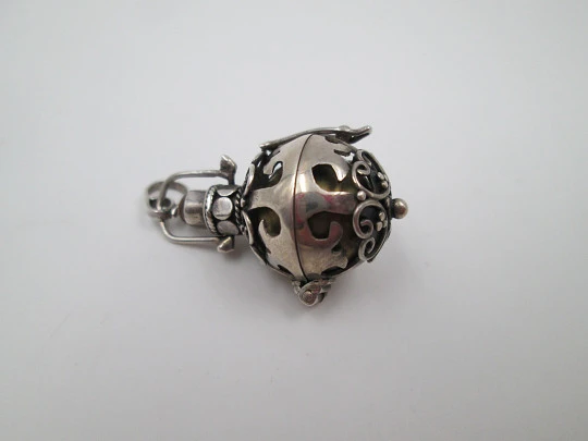 Angel caller openwork pendant. Sterling silver. Cabochon tiger eye. 1990's