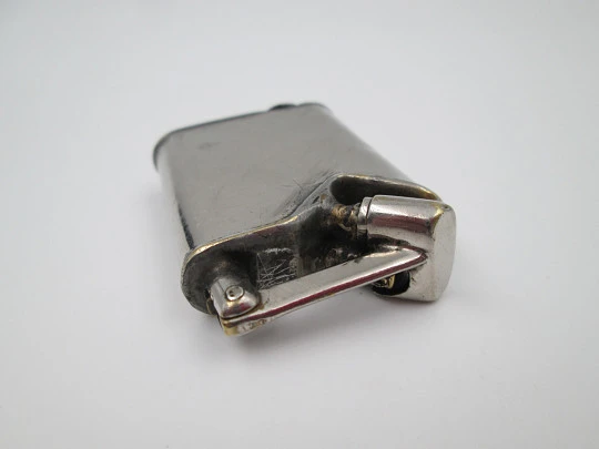 Antique lift arm gasoline pocket lighter. Chromed plated metal. Europe. 1930's