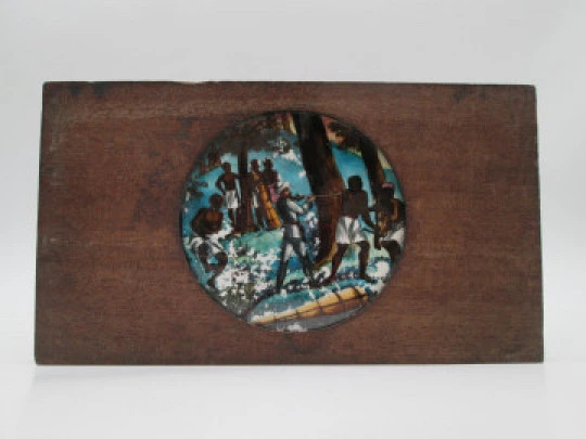 Antique magic lantern slide. Painted glass on wood frame. African colonies. 1910's. Europe