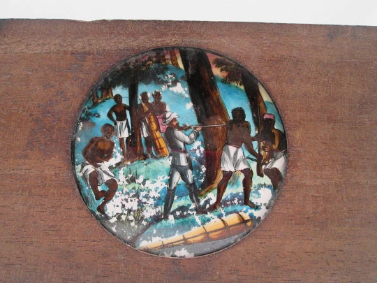 Antique magic lantern slide. Painted glass on wood frame. African colonies. 1910's. Europe