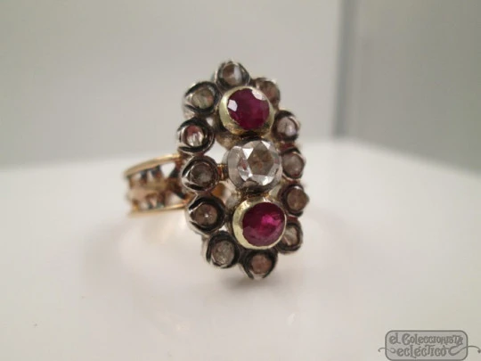 Antique ring. 18 karat yellow gold. Diamonds. Rubies. 1940's