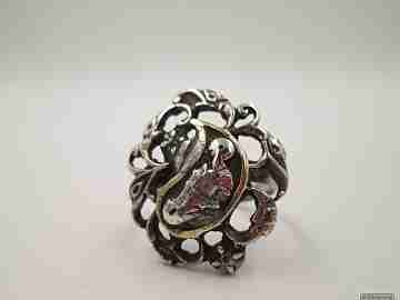 Antique ring. Silver and diamonds. Birds and scrolls. 1910's
