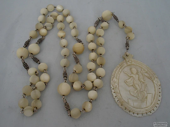 Antique rosary. Silver and mother of pearl. Jesus bas-relief