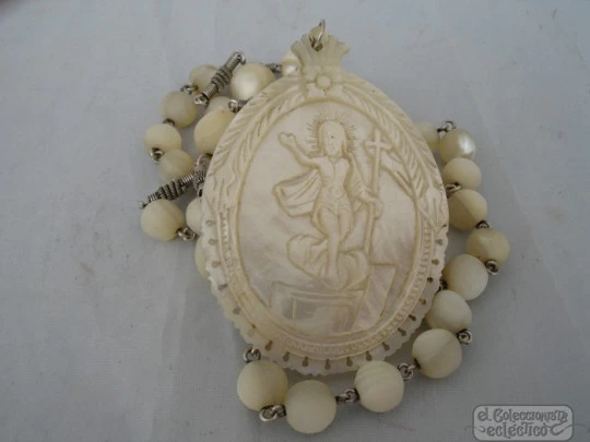 Antique rosary. Silver and mother of pearl. Jesus bas-relief