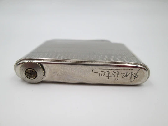 Aristo petrol musical lighter. Silver plated metal. Waves pattern. Austria. 1950's