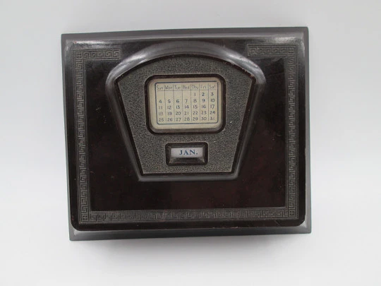 Art deco bakelite table perpetual calendar with desk box. Greek key molding. Europe. 1930's Art deco bakelite table perpetual calendar with desk box. Greek key molding. Europe. 1930's