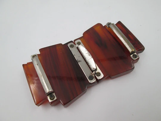 Art deco ladie's amber bakelite belt buckle. Geometric design. Silver metal details. 1930's