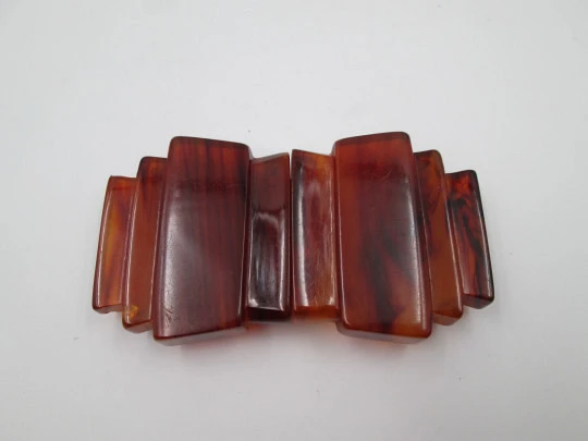 Art deco ladie's amber bakelite belt buckle. Geometric design. Silver metal details. 1930's