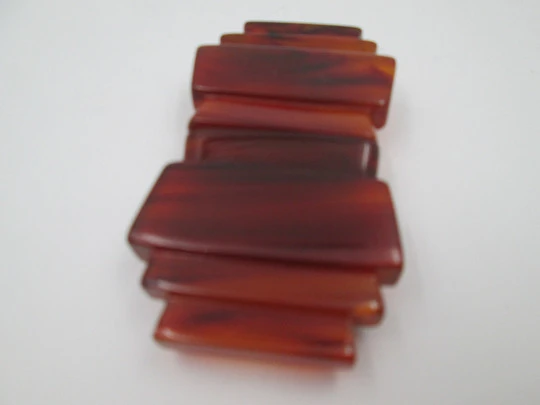 Art deco ladie's amber bakelite belt buckle. Geometric design. Silver metal details. 1930's