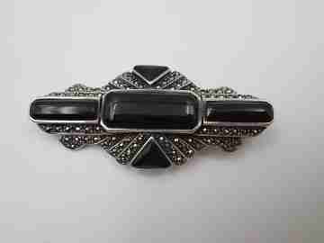 Art Deco style women's brooch. Sterling silver, marcasite gems and onyx. 1960's