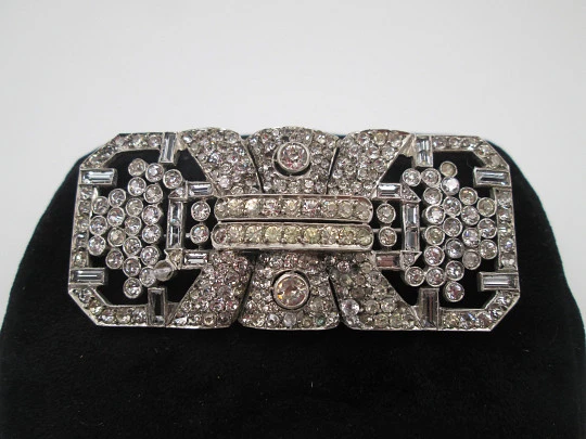 Art deco women's brooch. Sterling silver and rhinestones. Openwork design. Europe. 1930s