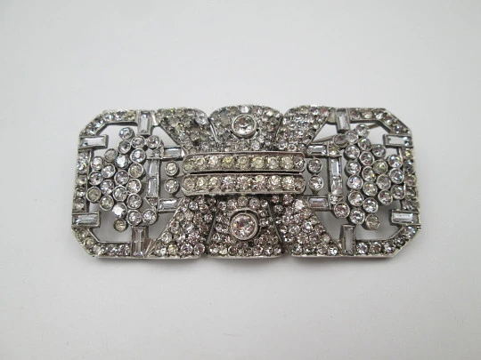 Art deco women's brooch. Sterling silver and rhinestones. Openwork design. Europe. 1930s