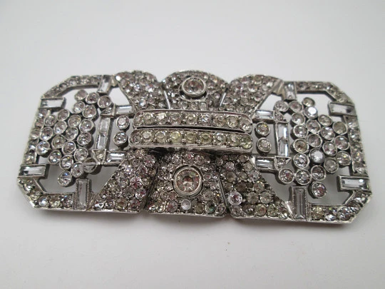 Art deco women's brooch. Sterling silver and rhinestones. Openwork design. Europe. 1930s