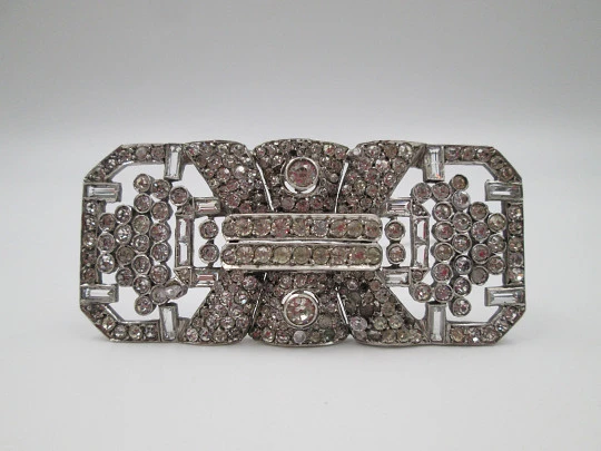 Art deco women's brooch. Sterling silver and rhinestones. Openwork design. Europe. 1930s