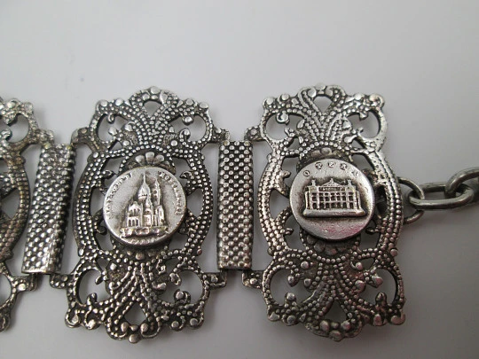 Articulated openwork bracelet. Sterling silver. Shield & Paris scenes