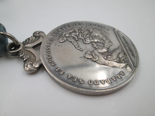 Ave Maria Congregation sterling silver medal. Pinillos artist. Blue ribbon. Spain. 1905