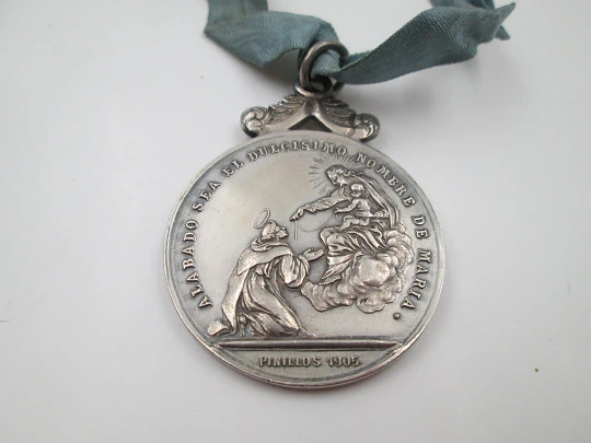 Ave Maria Congregation sterling silver medal. Pinillos artist. Blue ribbon. Spain. 1905