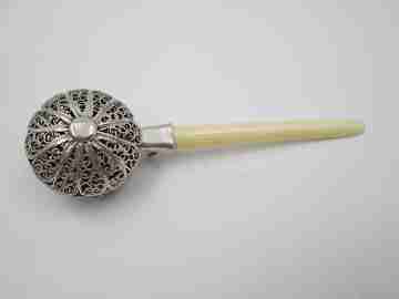 Baby rattle. Sterling silver. Openwork filigree sphere and ivory handle. 1970's