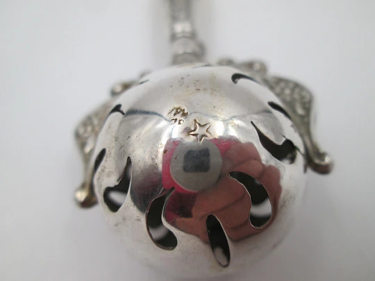 Baby rattle. Sterling silver. Openwork sphere and ivory handle. Box. 1960's. Floral motifs
