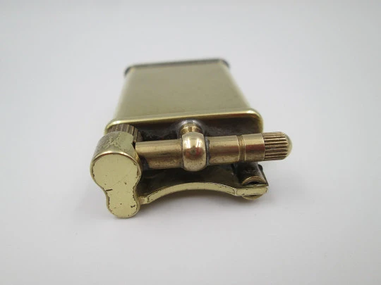 Ballantine's advertising pocket petrol lighter. Lift arm model. Gold-plated metal. 1980's