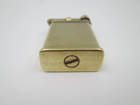 Ballantine's advertising pocket petrol lighter. Lift arm model. Gold-plated metal. 1980's