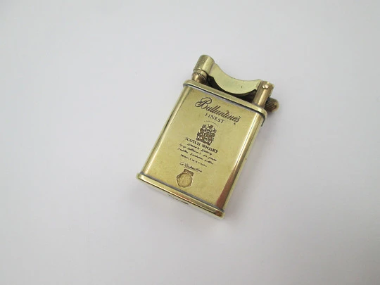 Ballantine's advertising pocket petrol lighter. Lift arm model. Gold-plated metal. 1980's