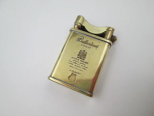 Ballantine's advertising pocket petrol lighter. Lift arm model. Gold-plated metal. 1980's