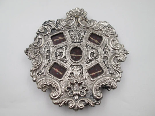 Baroque-style circular wall reliquary with five relics. Sterling silver. Spain. 1970's