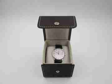 Baume & Mercier Geneve Classic unisex. Oro blanco 18k. Cuarzo. 1990. Suiza. Estuche