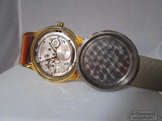 Baume & Mercier. Baño oro 20 micras y acero. 1960. Calibre 1080