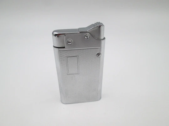 Benlow Master automatic pocket petrol lighter. Silver plated metal. Box and cover. 1950's Benlow Master automatic pocket petrol lighter. Silver plated metal. Box and cover. 1950's