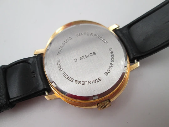 Blattina. Gold plated and steel. Manual wind. Calendar. Bitone sphere. Swiss. 1970's