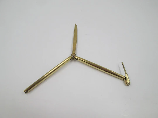 Bolígrafo desplegable articulado con abrecartas de bolsillo. Bronce. 1970