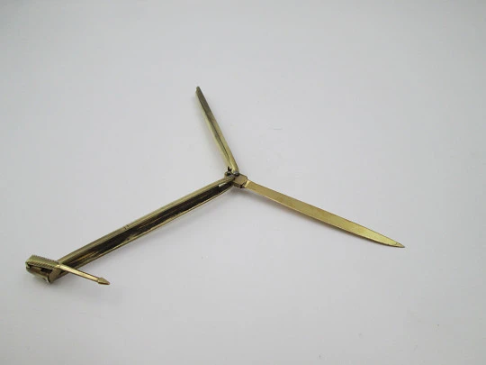 Bolígrafo desplegable articulado con abrecartas de bolsillo. Bronce. 1970