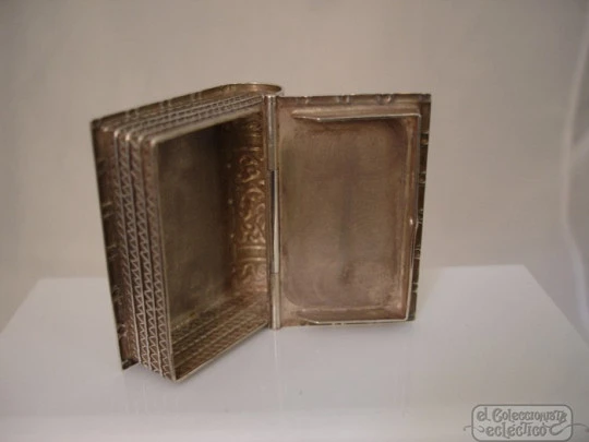 Book pillbox. Silver. 1970's. Scrolls and geometric motifs