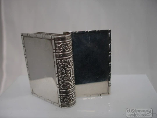 Book pillbox. Silver. 1970's. Scrolls and geometric motifs